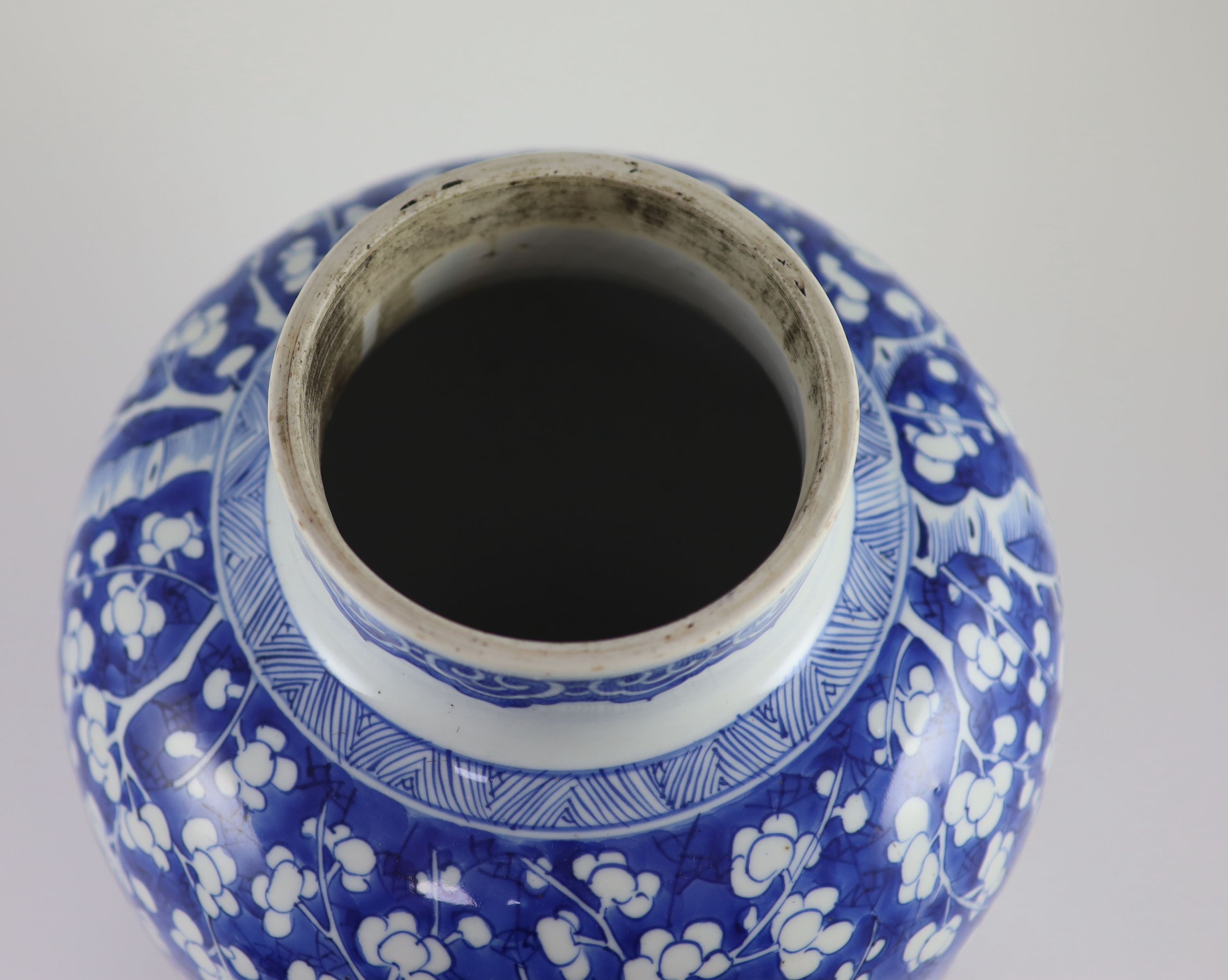 A good Chinese blue and white ‘prunus and cracked ice’ vase and cover, Kangxi period